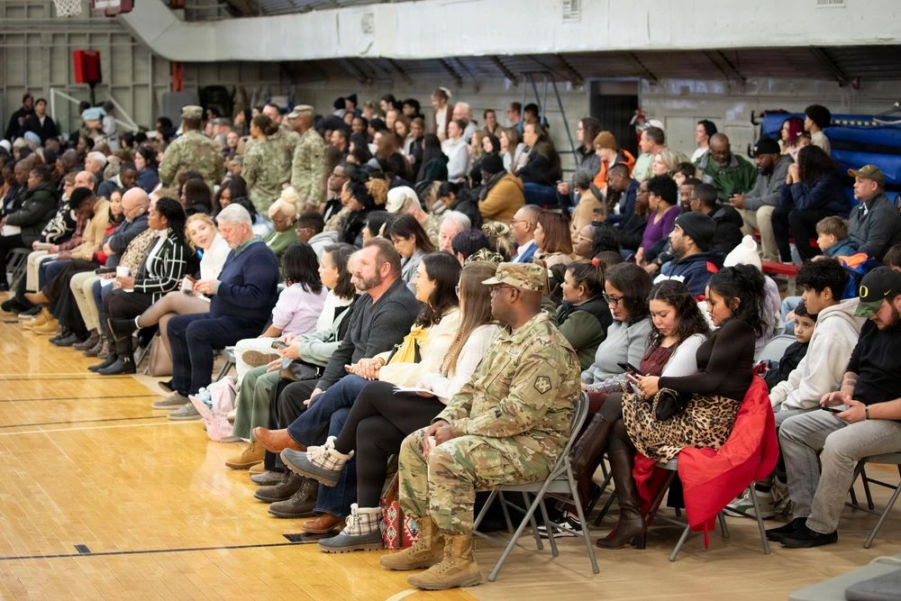 People gathered in a gymnasium